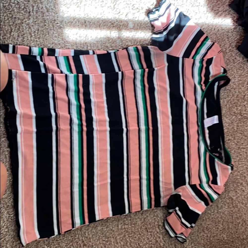 A ruffled sleeve pink striped shirt